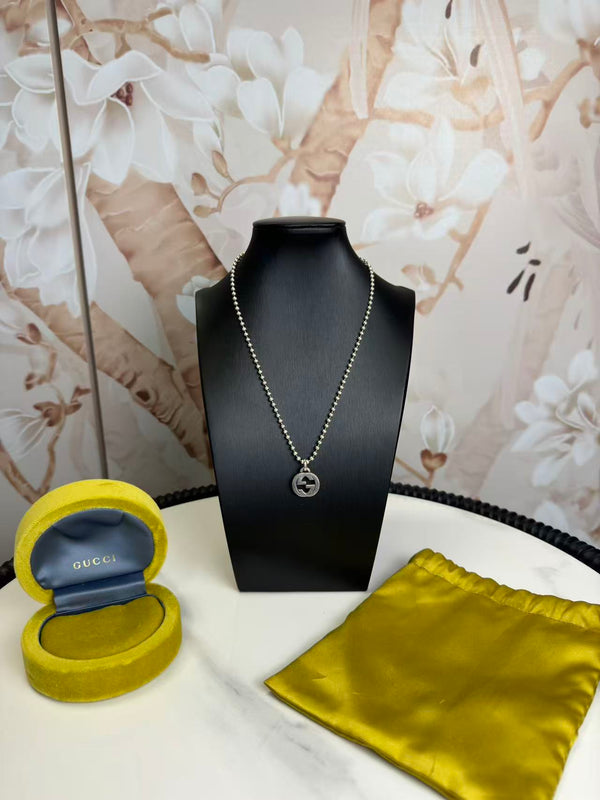 Gucci  Sterling Silver Interlocking GG Pendant Beaded